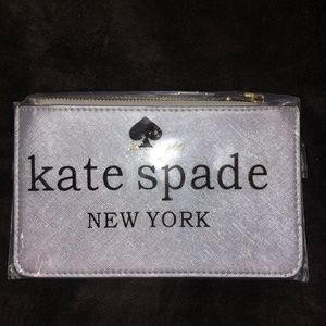 Brand new silver Kate Spade wristlet